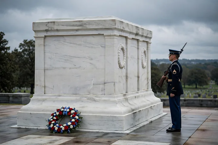 The Tomb of the Unknown Soldier at Arlington National Cemetery with an honor guard